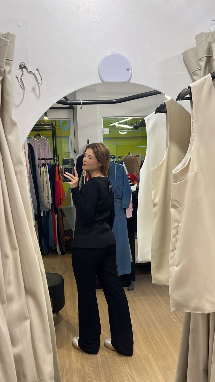 Colete alongado quatro botões