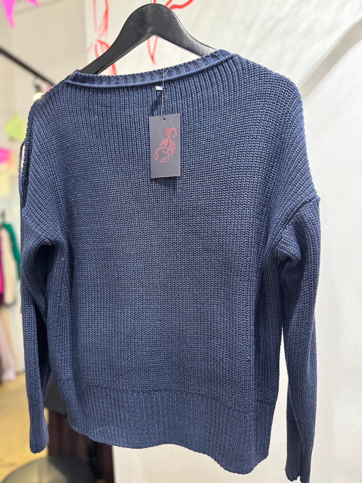 Blusa tricot com franjas