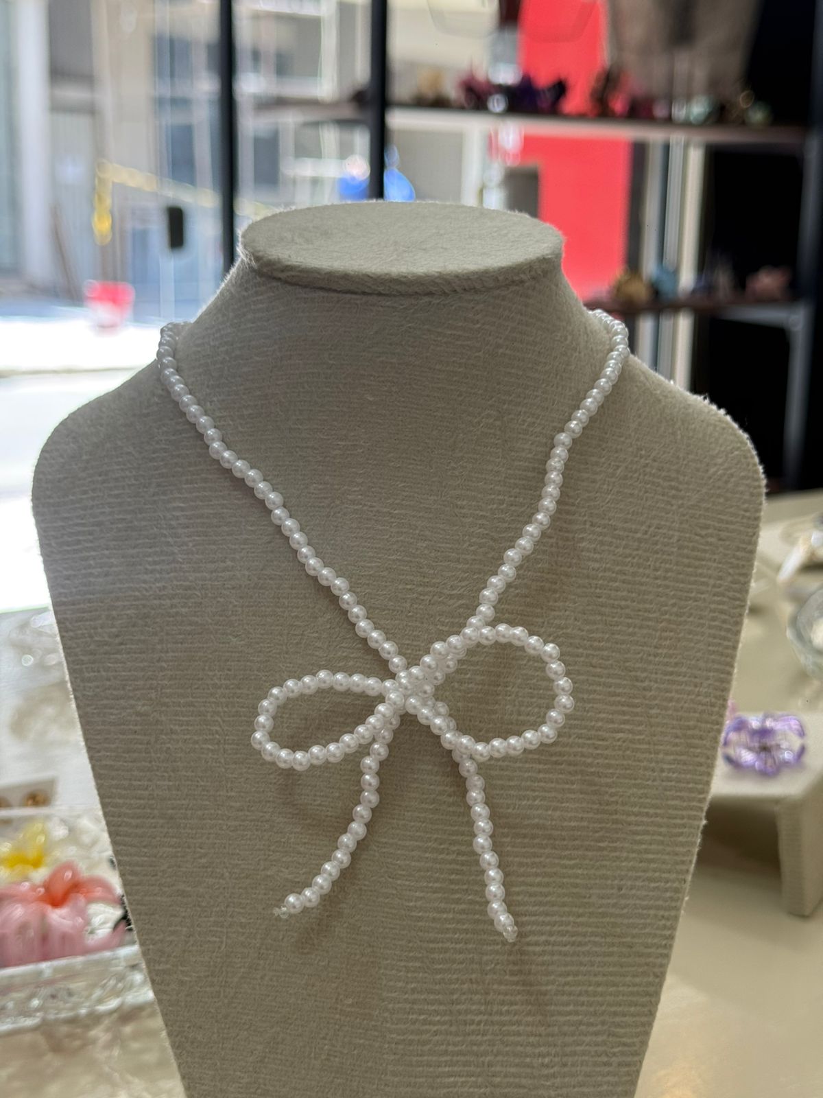 Colar laço de pérolas