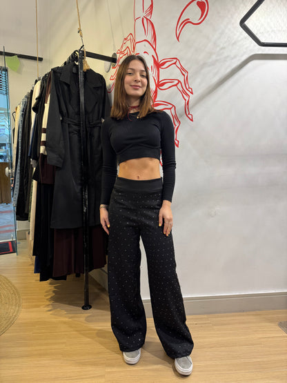 Calça de strass cae