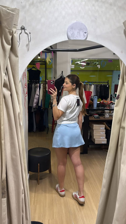 Conjunto saia de pregas com cropped