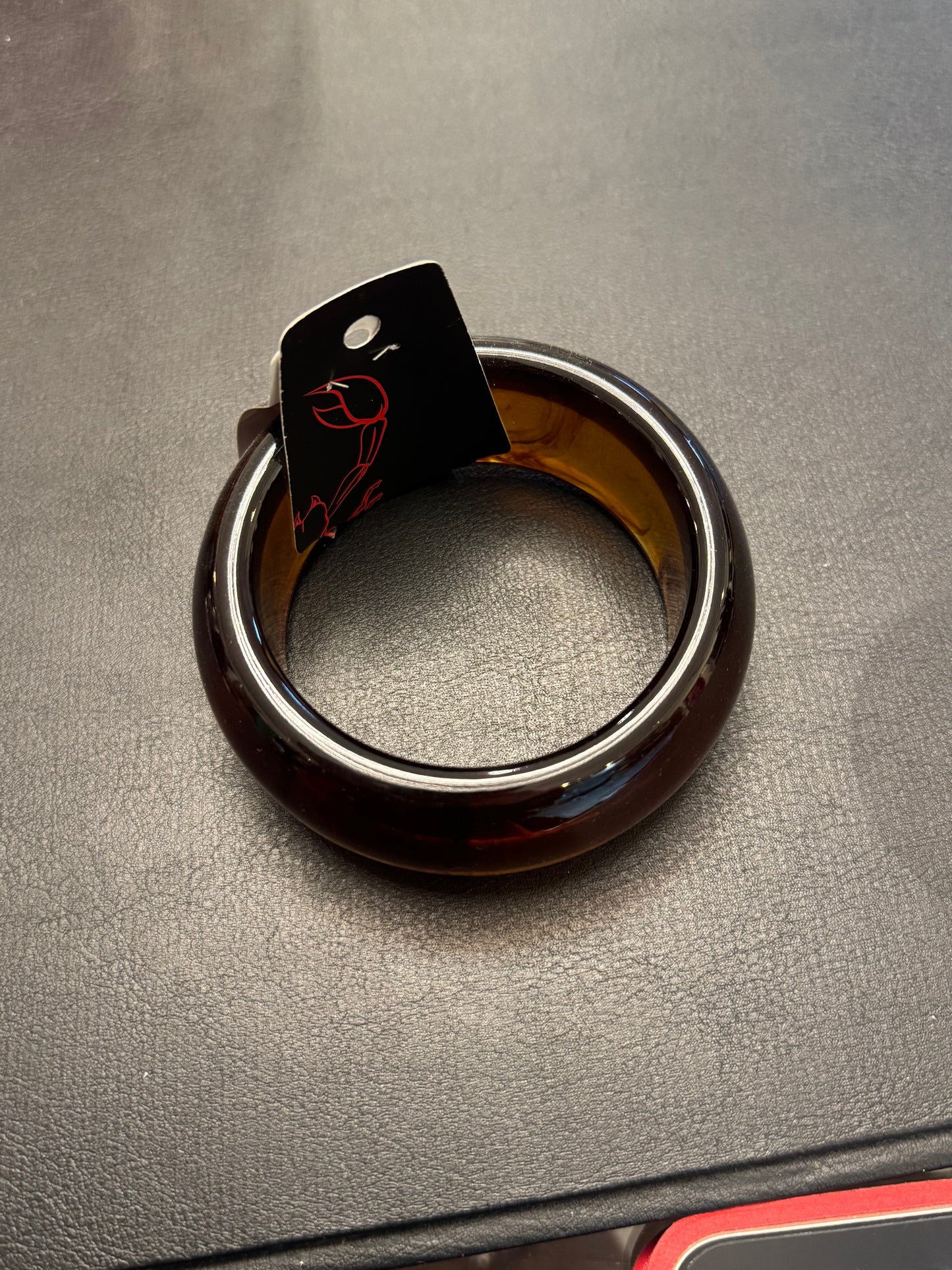 Bracelete meio braço transparente marrom