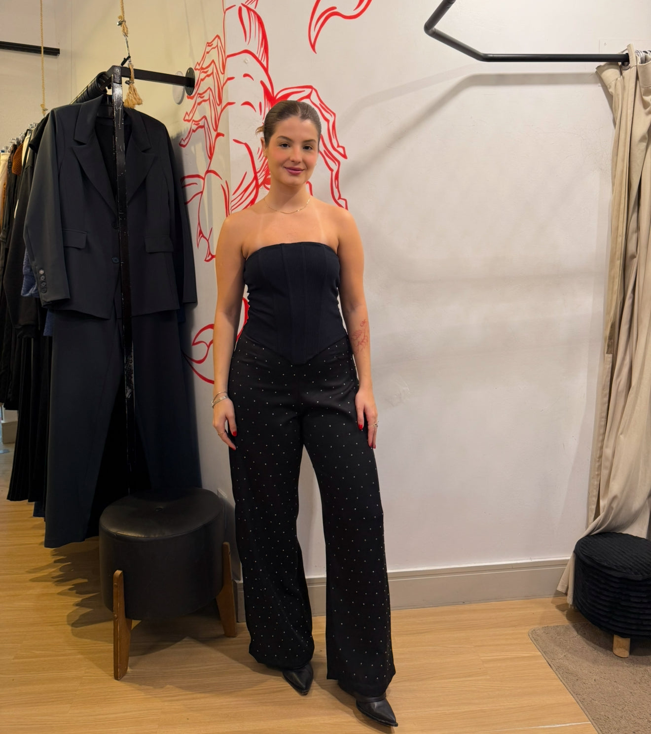 Calça de strass cae